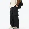Pantalones cargo rectos de moda estilo americano con bolsillos grandes, unisex, otoño vintage de corte holgado, pantalones casuales modernos y versátiles