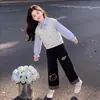 Conjunto de duas peças para meninas: moletom de manga comprida estilo "big girl", caimento casual solto, calça de perna larga xadrez nova para primavera/outono 2026