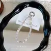 Corrente de celular popular com contas quadradas de cristal, pingente de chave, acessório de alta qualidade para capas de celular de meninas, chaveiros de bolsa e pequenos acessórios