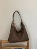 Bolso de hombro tipo tote transfronterizo 2026, estilo nuevo, gran capacidad, para mujer, con diseño de cuero suave retro, adecuado para ir al trabajo y versátil para el uso diario