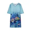 Vestido de Verano 2026 Europeo y Americano Nuevo Estampado Floral Moda Cuello en V Manga Media Cintura Media Jersey Falda Línea A