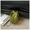 Bolso pequeño con diseño transfronterizo y patrón tejido para mujer, nuevo y moderno bolso tipo cubo de alto valor, bolso cruzado de hombro único vintage, moderno