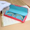 E88 Estuche de cuero PU para gafas compresión creativo caja para ojos pequeño botón magnético a presión caja para gafas de miopía logo personalizado