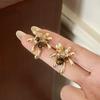 Outono e inverno vintage Maillard Tiger Eye Stone Ear Buckle Fashion Light Luxury High-end Sense Brincos 2024 Novos brincos quentes para mulheres