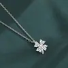 Collar de trébol de cuatro hojas de la suerte, gargantilla de diseño nicho de lujo ligero, cadena para clavícula con colgante de flor estilo minimalista ins al por mayor