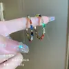 Exquisitos pendientes largos cortos con borlas incrustados de perlas y diamantes para mujer diseño de nicho de lujo ligero pendientes de lazo amor