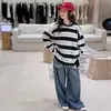 Conjunto de Roupas de Outono para Meninas 2026 Novo Estilo Crianças Médias e Grandes Camiseta de Manga Longa Listrada com Rosto Sorridente Calcinha Jeans Conjunto de Duas Peças Tendência