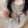 Colar de Miçangas Florais Estilo Boêmio Novo 2025 para Mulheres, Novo Estilo Chinês Estilo Nacional Corda de Couro Colar de Miçangas Estilo Étnico