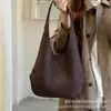 Bolso retro de gran capacidad para mujer, nuevo estilo 2026, bolso de hombro, bolso de axila, con una sofisticada textura tejida, adecuado para ventas transfronterizas