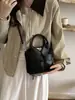 Bolsa de Mão Nova Estilo Retrô Outono 2026 Moda Feminina Versátil Bolsa Transversal Bolsa Tote Pequena para o Trabalho Bolsas Femininas Atacado