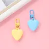 Llavero de corazón de melocotón nuevo color caramelo amor funda protectora aipods funda para auriculares colgante adornos para bolso