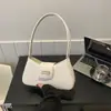 Bolso de axila de nicho estilo francés 2026 nuevo modelo bolso de mano simple bolso de hombro de moda bolso cruzado bolso pequeño para mujer