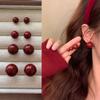 Pendientes de perla roja de alta calidad para mujer, estilo retro de Hong Kong, con atmósfera blanca de Año Nuevo, pendientes con perforación en la oreja