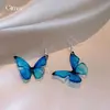 Brincos de Borboleta Manchadados em Resina Azul Atmosférica, Toque de Luxo Leve e de Alta Qualidade, Brincos Únicos, Brincos da Moda em Estilo Nicho