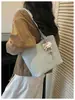 Bolso tote de mimbre tejido a mano retro de nicho para mujer, nuevo y moderno 2026 de gran capacidad para el trabajo y los desplazamientos, bolso de hombro de moda