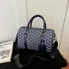Venta al por mayor transfronteriza de artículos impresos en stock: Bolso tote, bolso de hombro y bolso cruzado de moda 2026, de gran capacidad, simple, de banda ancha
