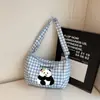 Bolsa de estilo japonés con estampado de cuadros de dibujos animados de alto valor para mujer, bolsa tipo dumpling de gran capacidad para verano, versátil para estudiantes, para ir al trabajo, de hombro o cruzada