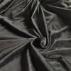 El terciopelo de cristal negro es un producto popular de bajo costo, voluminoso, suave y cómodo, utilizado para ropa, calzado y juguetes, hecho de felpa corta de cristal super suave.