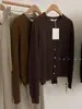 Cárdigan de punto grueso con cuello redondo para mujer, nueva colección otoño/invierno 2026, estilo coreano, suéter simple y estilizado, prenda exterior versátil, moderno