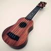 Ukelele para niños Espacio Tendencia Nacional Guitarra Pequeña Puede Tocar Iluminación Juguetes de Educación Temprana Música Guitarra para Principiantes