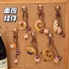 Colgante Creativo Lindo de Pan Alcalino para Niñas, Llavero Encanto de Juguete de Comida Realista, Pequeño Accesorio Versátil de Resina para Mochilas