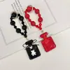 Pingente de chaveiro de garrafa de perfume com laço adornado com diamantes com corrente de contas de cristal, acessório de bolsa requintado e brilhante com diamantes, corrente para pendurar no celular