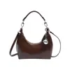 Versión Coreana Bolso de Mano Brillante de Charol de Nicho Bolso Dumpling para Mujer Otoño 2025 Nuevo Casual Lujo Ligero Bolso de Hombro Único Bandolera