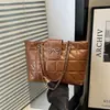 2026 Textura Macia Acolchoada Corrente Grande Capacidade Nova Tendência Moda Casual Laço Único Ombro Bolsa Tote Grande