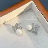 Pendientes de moda populares transfronterizos para el día a día, diseño de temperamento, pendientes simples de alto nivel, pendientes retro con personalidad, pendientes literarios
