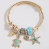 1 Pulsera Versátil de Metal a la Moda con Colgantes Sencillos de Tortuga y Estrella de Mar, Accesorios Multielemento y un Diseño Único