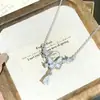 Collar de Acero de Titanio Doble Mariposa de Lujo Ligero Estilo Coreano para Mujer con un Diseño Único, Colgante de Borla Gota de Agua, Cadena de Clavícula Esmaltada de Moda al por Mayor
