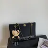 Bolso de cadena bordado con patrón de diamantes para mujer, nueva colección primavera 2026, bolso cruzado versátil, bolso de hombro de moda, bolso tote moderno