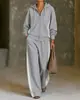 Colección de otoño e invierno 2026 para mujer, transfronteriza, europea y americana: Sudadera con capucha y cremallera de bloques de color y pantalones de pierna ancha, un conjunto informal y deportivo de dos piezas