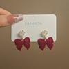 Pendientes de lazo de terciopelo rojo festivos de otoño e invierno de Corea del Sur, pendientes elegantes de amor dulce para mujer.