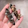 Pinzas para el cabello de pico de pato de alta gama estilo coreano con incrustaciones de perlas y diamantes para mujer, con un diseño lujoso para flequillos laterales y peinados en la parte posterior de la cabeza, un nuevo accesorio para el cabello para mujer