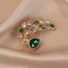 Broche de gota de agua verde esmeralda electrochapado de alta gama 2026 para mujer, Broche de abrigo lujoso, Accesorio de alfiler para ropa