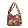Bolsa transversal de novo estilo transfronteiriça para mulheres de meia-idade, apresentando color-blocking, um design retrô moderno, múltiplos compartimentos e grande capacidade, tornando-a ideal para o trajeto diário.