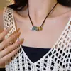 Nuevo collar trenzado de cuerda con cuentas de estilo chino vintage moderno para mujer, cadena para la clavícula versátil y elegante de nicho, venta al por mayor