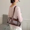 Bolso tipo almohada coreano de nicho para mujer, nuevo bolso de mano vintage para el día a día 2026, estilo dulce y genial de chica popular, bolso de hombro