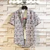2025 Transfronteriza Nueva Camisa Casual de Manga Corta Floral para Hombre Marca de Tendencia Moda Multicolor Estilo Playa Camisa Casual para Hombre