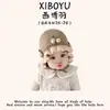 Bonitos y adorables gorros de otoño e invierno para niños, con diseño de poner, material de punto y una serie de dibujos animados, que brindan abrigo y protección para los oídos para bebés y niños pequeños.