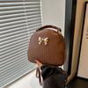 Mochila 2024 Verão Nova Moda Versátil Bolsa de Ombro Transversal Estilosa Concha Pequena Redonda Bolsa com Laço Feminina