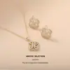 Aretes y Collar Set de Cobre Perla Brillante Lleno de Circonio Trébol de Cuatro Hojas No se Desvanece para Mujer Joyería de Lujo Ligero de Alta Gama Transfronteriza