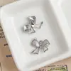 Una Variedad de Colgantes de Lazo de Aleación Dulces y Frescos Joyería Hecha a Mano DIY Collares de Mano Pendientes Colgantes Accesorios Materiales