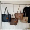 Sacola transfronteiriça feminina de grande capacidade 2024 Novo estilo Bolsa Outono High-end Bolsa de ombro Bolsa geral de estudante universitário