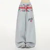 Calça de moletom vintage com patchwork da Union Jack desgastado e perna larga para homens e mulheres, estampa de letras estilo americano, calça casual reta solta com cordão