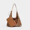 Bolso de mujer de gran capacidad 2026 nuevo bolso de mano de moda con estampado de leopardo, bolso de hombro de alta gama, bolso de estilo retro para chicas a la moda