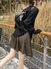 [Kaipu] Falda Corta de Otoño Francesa de Trece Líneas con Gamuza Nebulosa, Abertura y Corte Diagonal, Falda de Moda para Mujer BQA6178