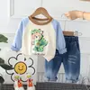 Diseño de Color Contrastante Otoño Cuello Redondo Estampado de Animales de Dibujos Animados Sudadera de Manga Larga y Jeans Traje de Dos Piezas Fabricante Venta al por Mayor