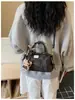 Bolsa Boston 2026 Outono Nova Tendência Design de Nicho Simples Portátil Versátil Moda Ombro Único Bolsa de Axila